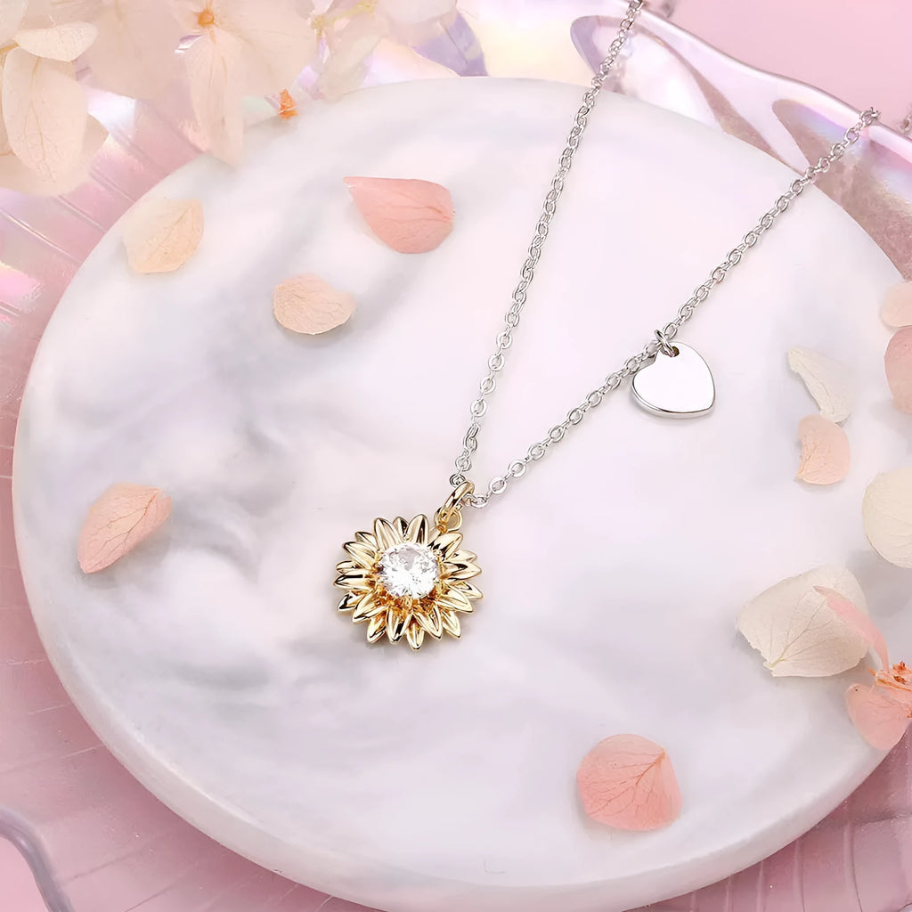 925 silver adjustable sunflower necklace with geometric daisy pendant on a cross chain.