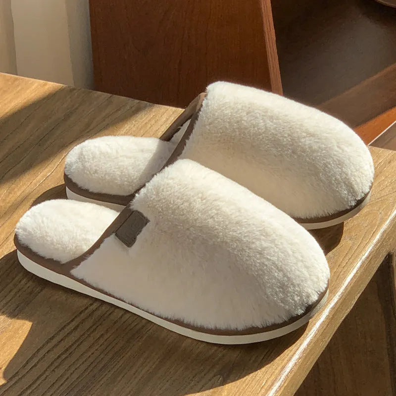 PVC plush winter slippers in solid colours with non-slip soles for indoor wear