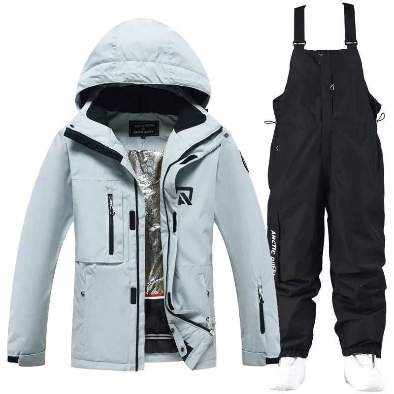 Men's and women's winter ski suit in blue and black colour combination for snow sports