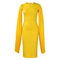Yellow women's long sleeve evening gown with high waist and a pleated shawl draped over the shoulders.