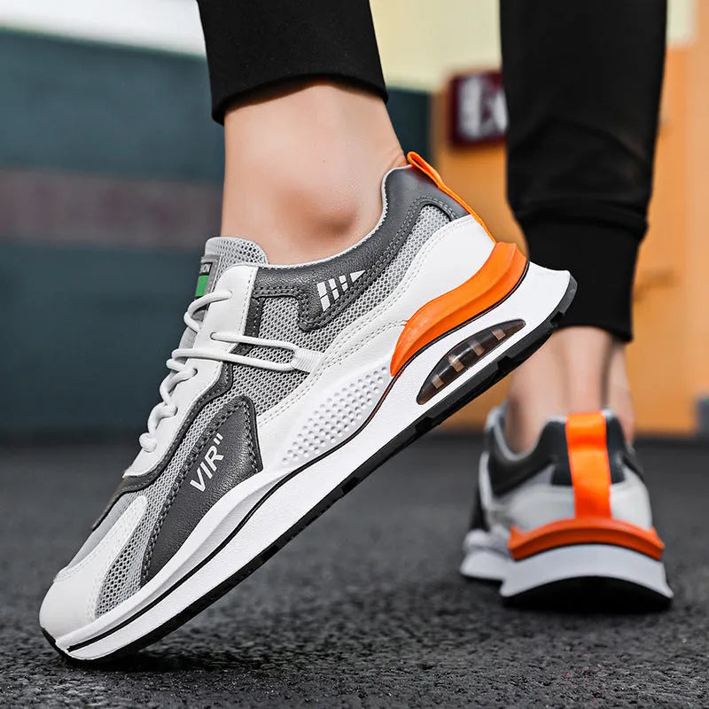 Men's grey breathable mesh casual running shoes with a round toe and EVA sole on a white background.