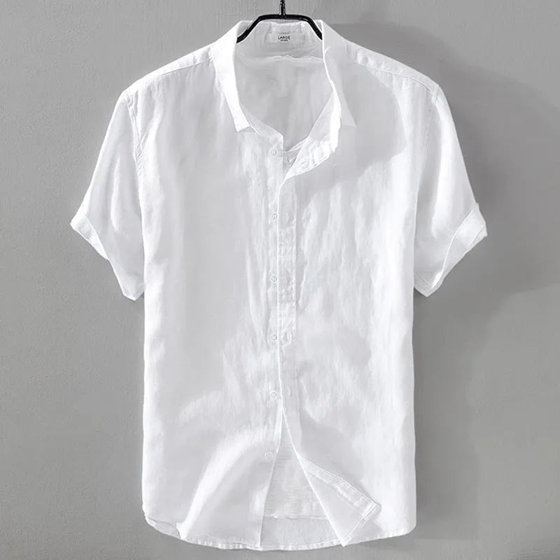 Men's loose fit short sleeve linen shirt in apricot colour on a hanger