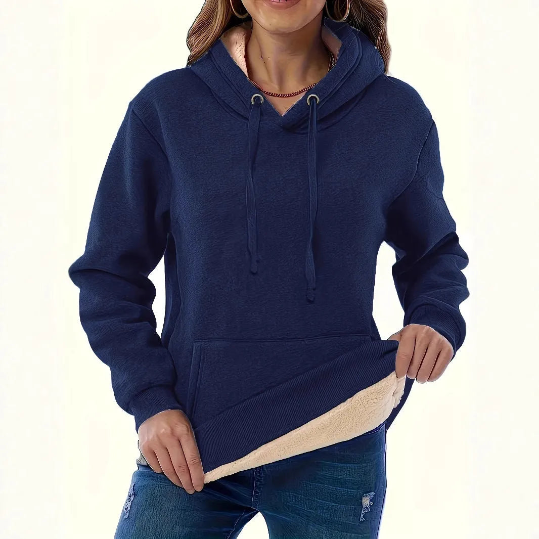 Women's loose grey hooded sweater with a 3D textured pattern on the front.