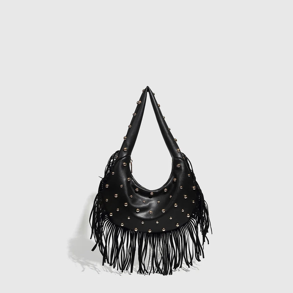 Retro style black shoulder handbag with a tassel decoration, shown with interior mobile phone pocket.