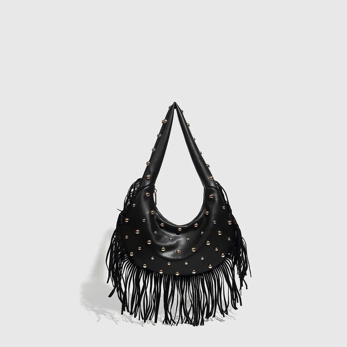 Retro style black shoulder handbag with a tassel decoration, shown with interior mobile phone pocket.