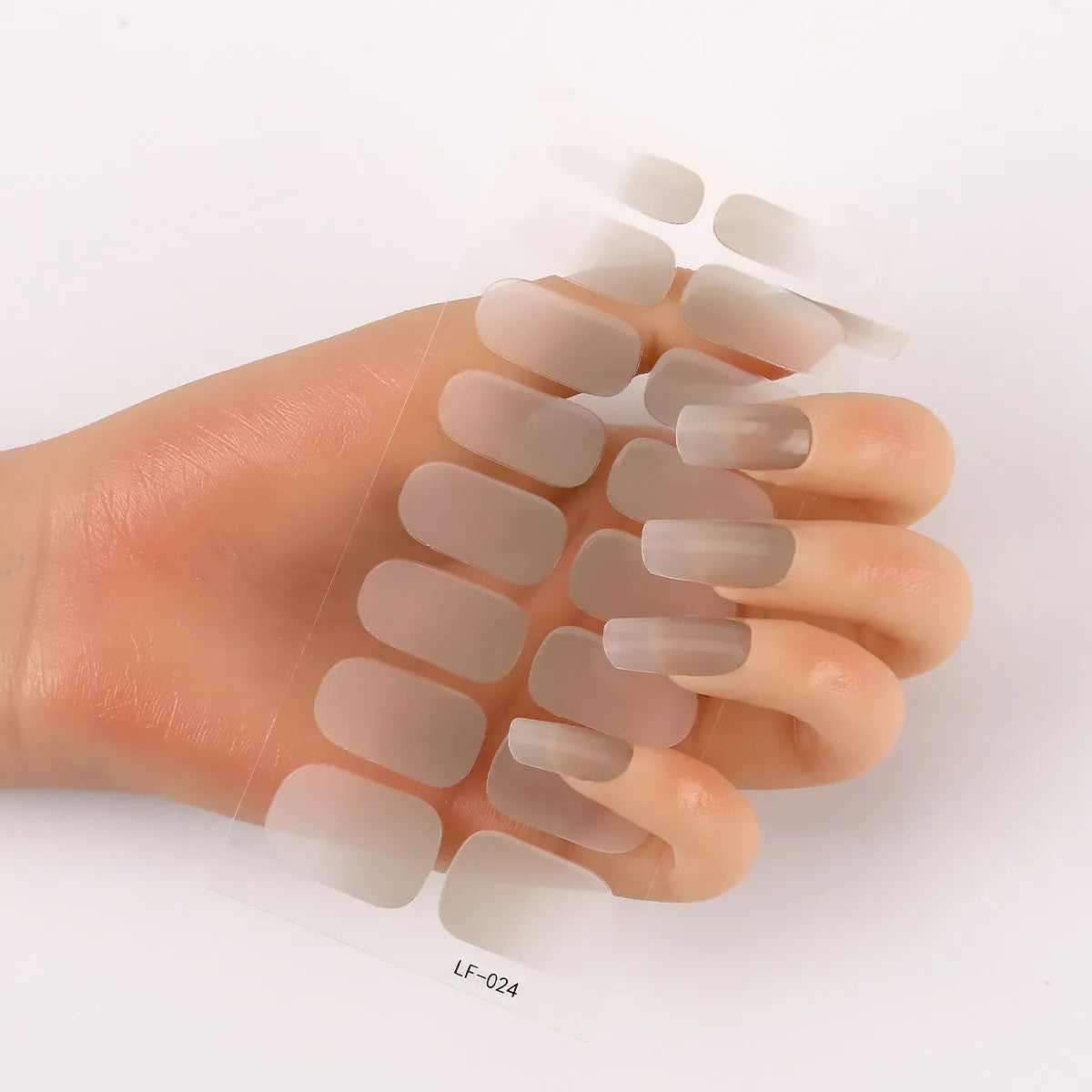 Full nail art sticker sheet showing 16 different solid colour designs including European simple nails and floral patterns