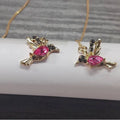 Women's hanging bird earrings with zirconium wing elements in blue, red, or red lvzuan colours