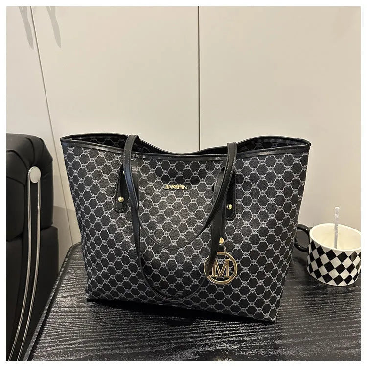 Street trend shoulder bag made from PU material with sewing thread decorative elements