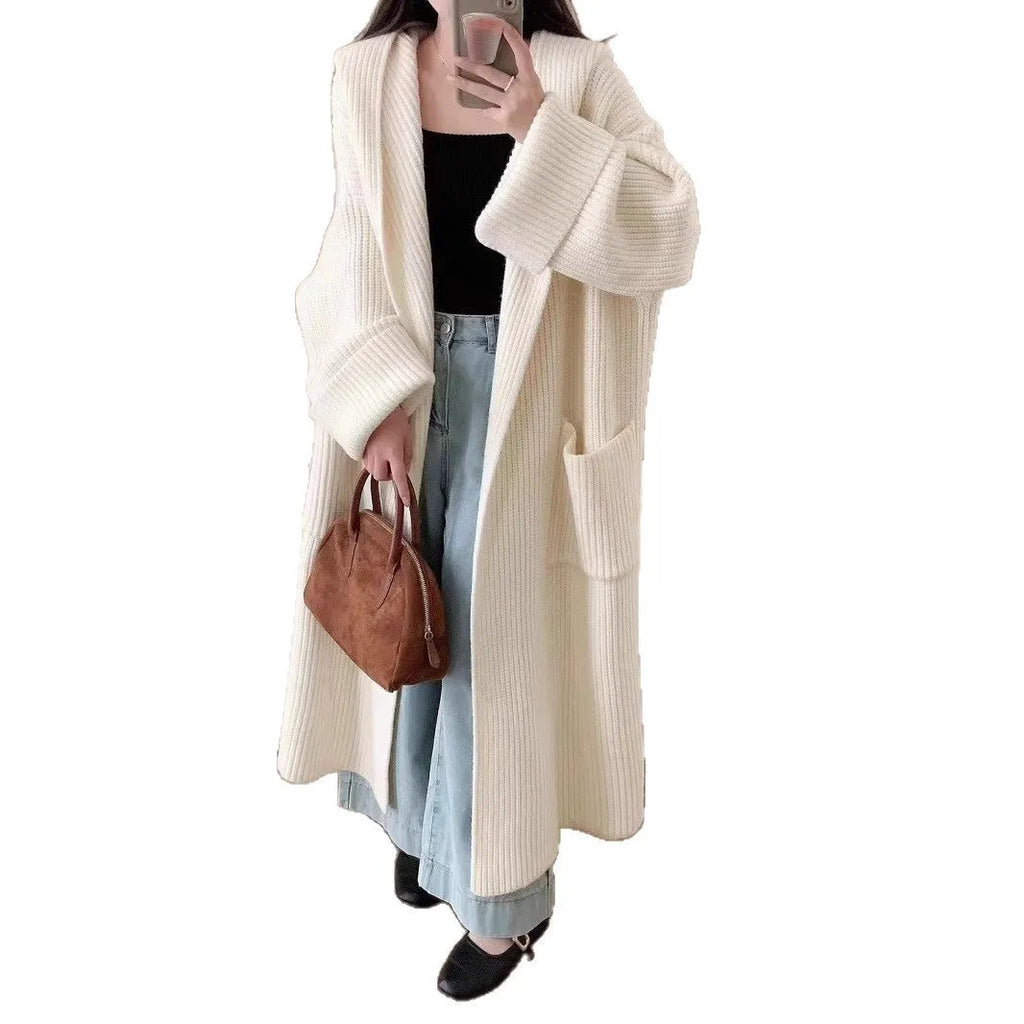Loose fit women's hooded cardigan coat in soft acrylic fabric, shown in milky white.