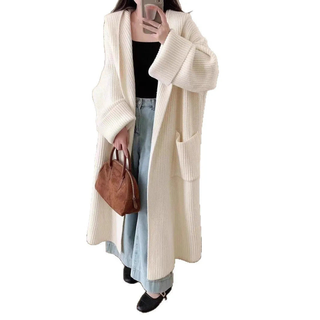 Loose fit women's hooded cardigan coat in soft acrylic fabric, shown in milky white.