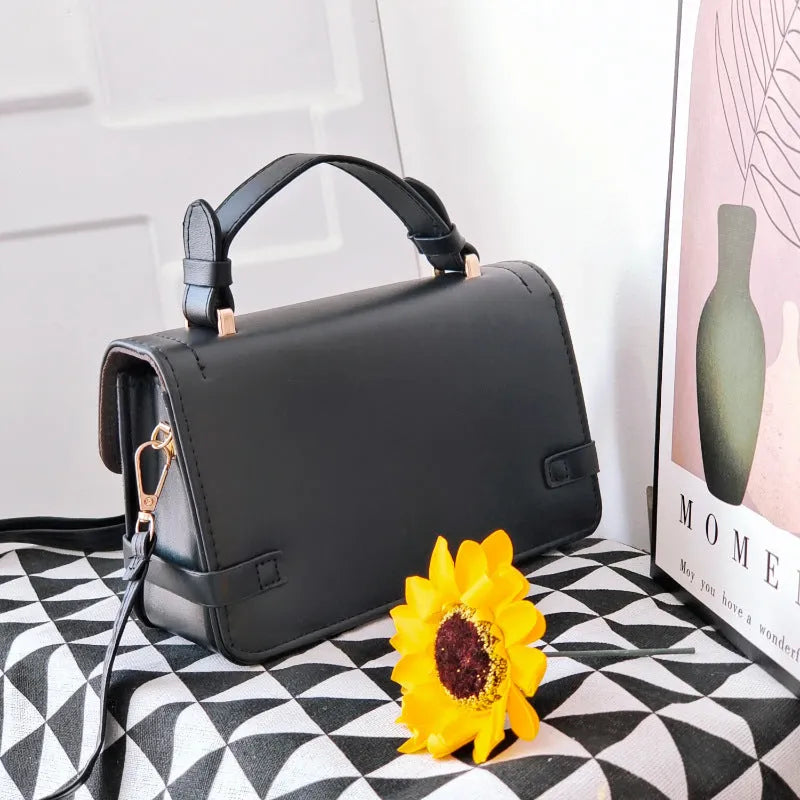 Retro-style square crossbody bag with floral stitching and a diamond pattern in PU leather.