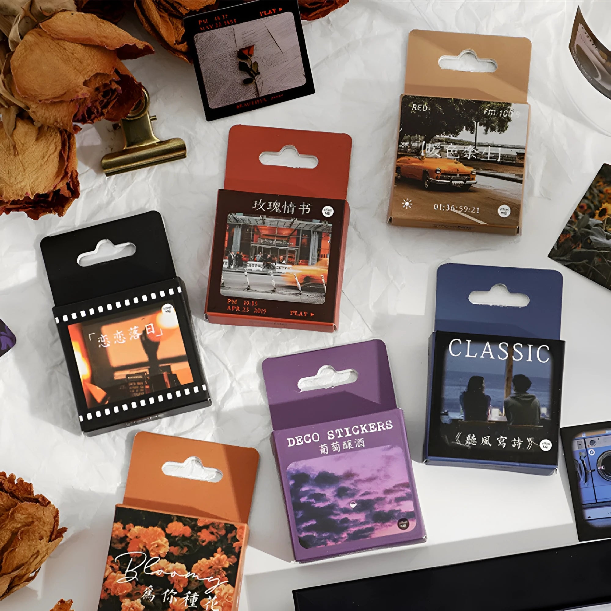 Box of Nordic style decorative stickers showing six colour themes with 44mm square sizing