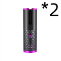 White portable automatic curling iron with a gold ceramic barrel and USB charging cable on a pink background.