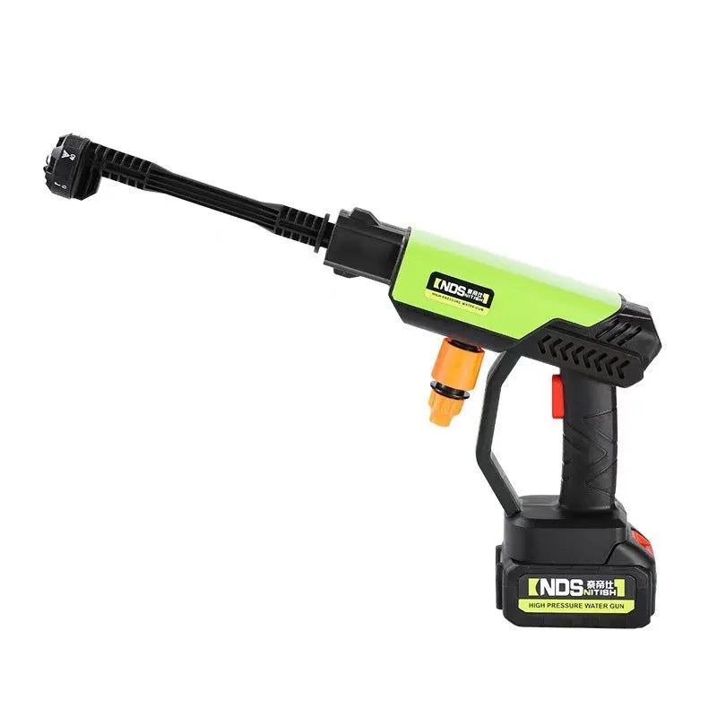 Green cordless high-pressure water gun with metal nozzle and accessories including battery and foam pot