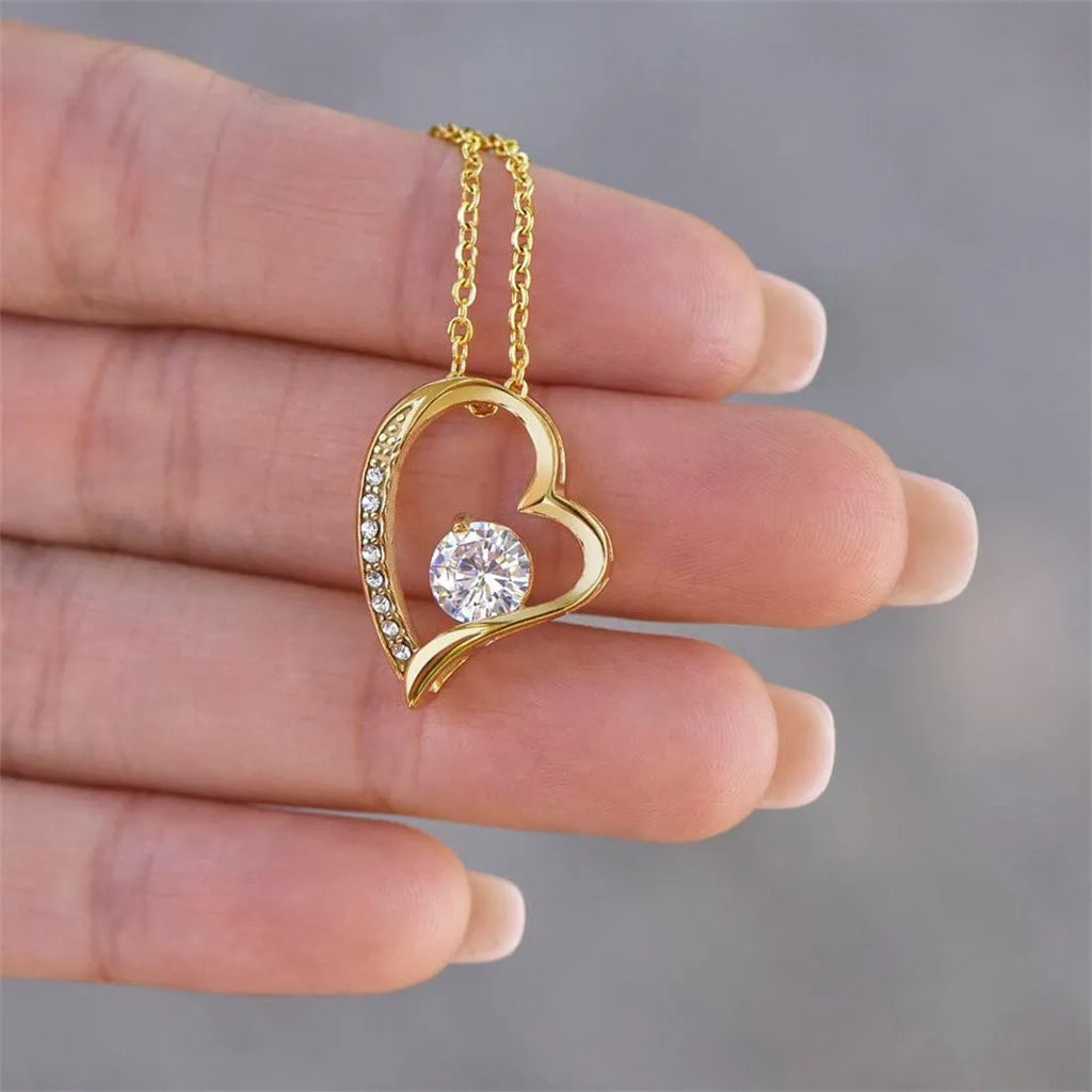 Hollow heart pendant necklace in gold or silver finish with gift packaging