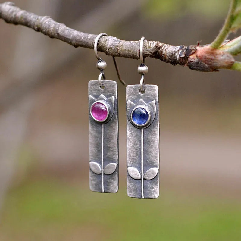 Antique finish red sapphire geometric drop earrings with ellipse design on electroplated metal