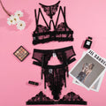 Black women's bikini set with embroidery stitching detail on the mesh fabric, three-point style.