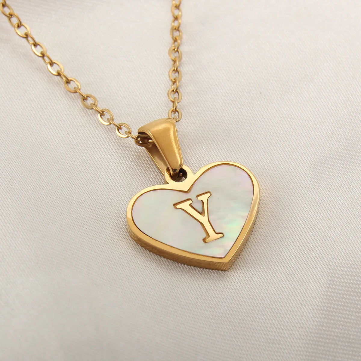 Gold plated personalised heart necklace with white shell on a 45cm chain