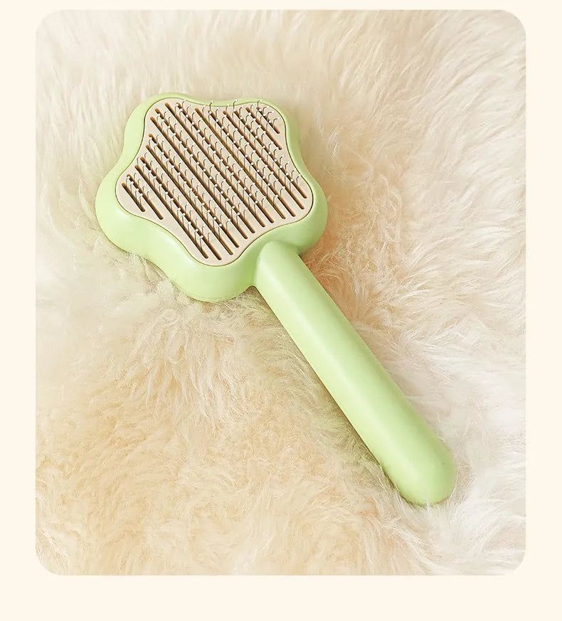 Self-cleaning cat comb magic wand with stainless steel needle teeth in green or yellow colour options