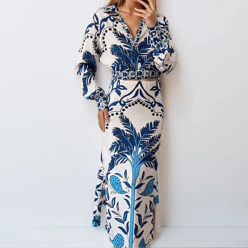 Women's floral print casual set with long sleeve top and long matching skirt.
