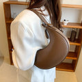 Retro women's dumpling-shaped shoulder bag in PU leather with zippered pocket