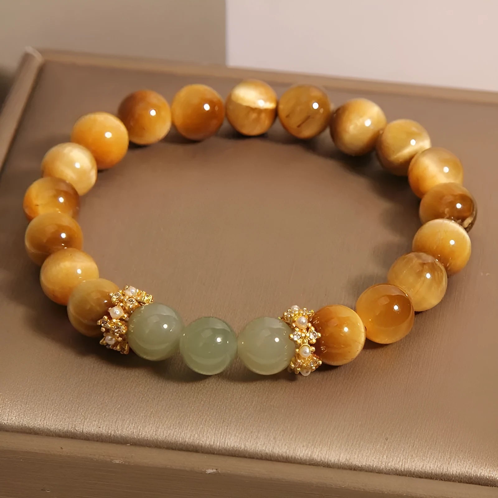 Natural yellow Tiger's Eye bracelet with Chinese auspicious patterns in U-shaped design