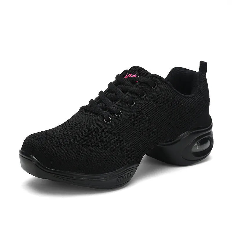 Women's white breathable flyknit mesh dancing shoes with a soft PU sole on a light background.