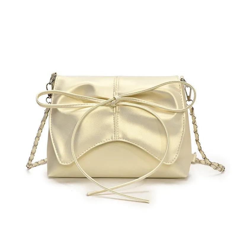 Women's black underarm crossbody bag with visible sewing lines and large capacity design