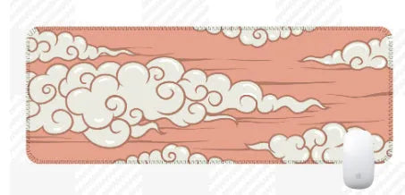 Large rectangular cloud pattern desk mat made of natural rubber on a wooden desk.
