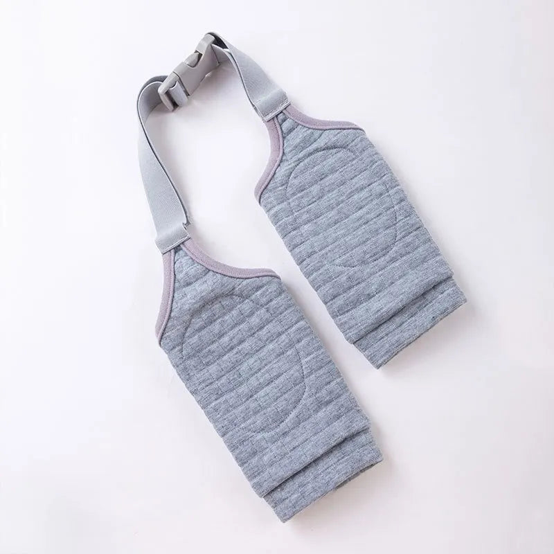 Blue dog knee protector pad with thick elbow padding and adjustable strap, shown with a matching scarf.