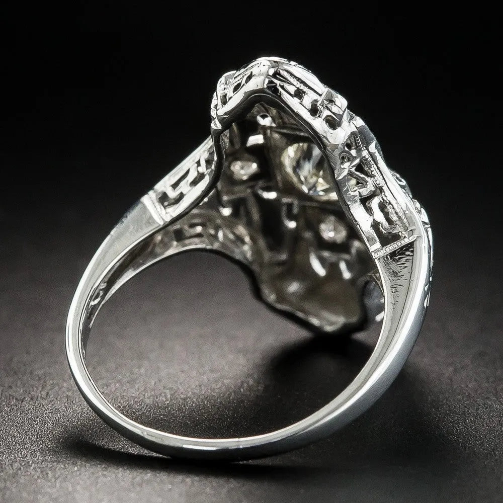 Geometric pattern hollow-out silver plated ring with diamond studs on a copper base.