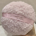 Oversized rectangular plush powder puff measuring 150x75mm in white colour