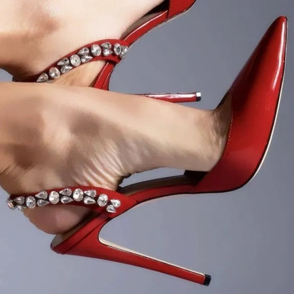 Women's black patent leather rhinestone high heel sandals with pointed toe and ankle strap.