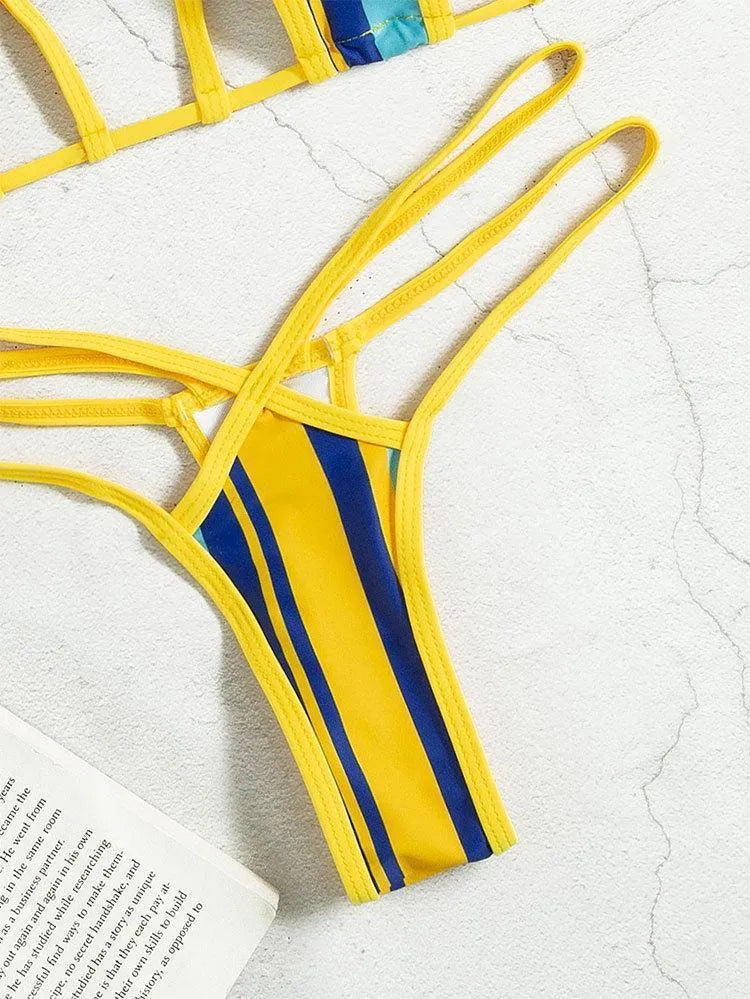 Yellow women's split swimsuit with neck-hanging top, hollow backless design, and high waist shorts