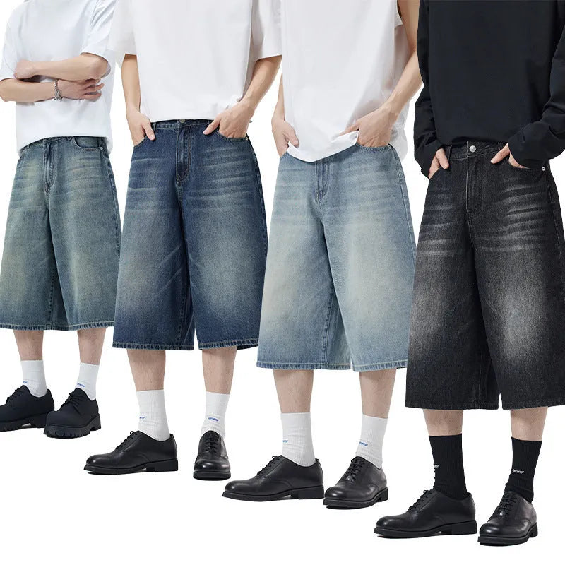 Men's light blue loose-fit cropped denim shorts with a straight leg on a neutral background.
