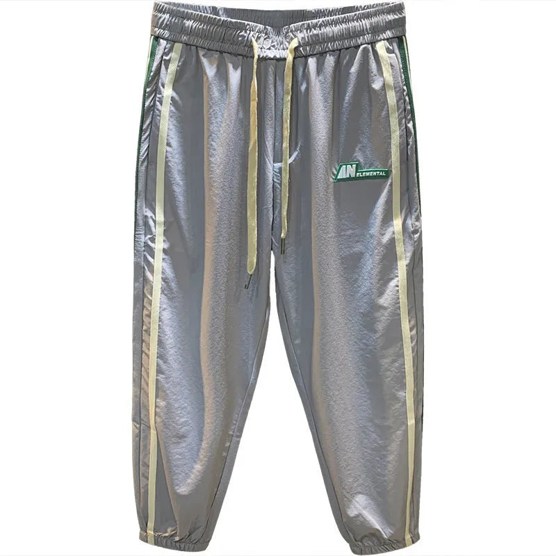 Men's black ice silk cotton harem pants with a relaxed fit and mid-waist.