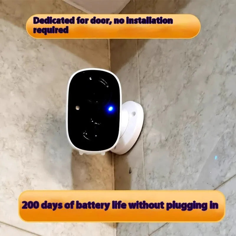 Wireless battery-powered indoor surveillance camera with compact ball design on included bracket.