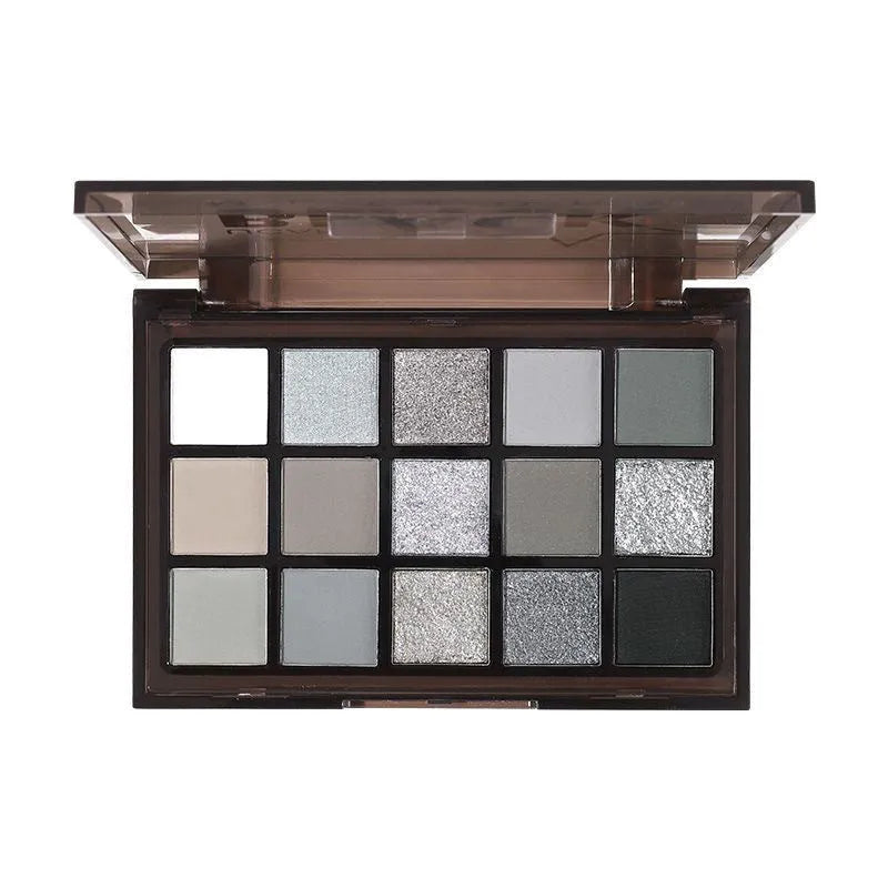 15-colour eye shadow palette showing grey, black, brown and blue shades for smoky makeup