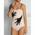 Women's one-piece bikini swimsuit with matching gauze skirt in polyester fabric