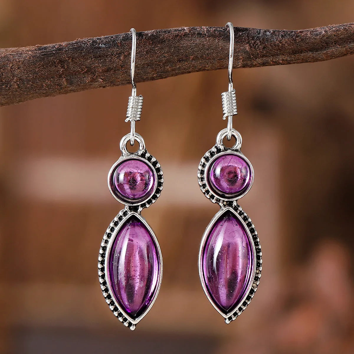 Vintage geometric pendant earrings with black and purple electroplated finish on zinc alloy.