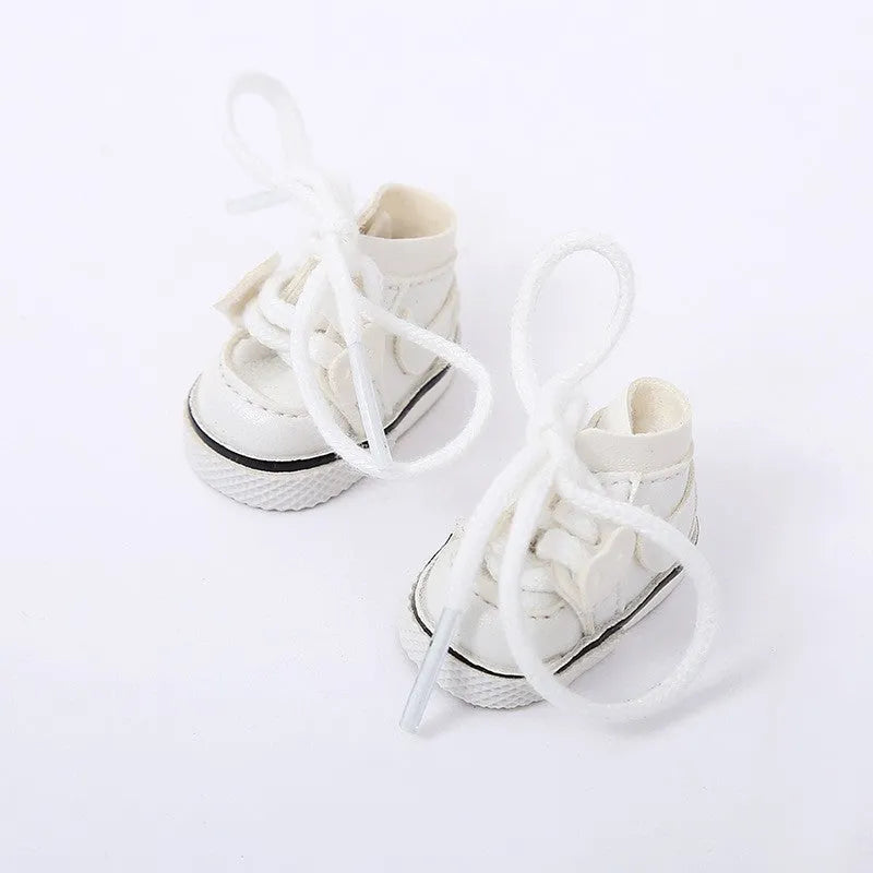 Set of miniature doll replacement shoes in various styles and colours for 17cm scale figures.