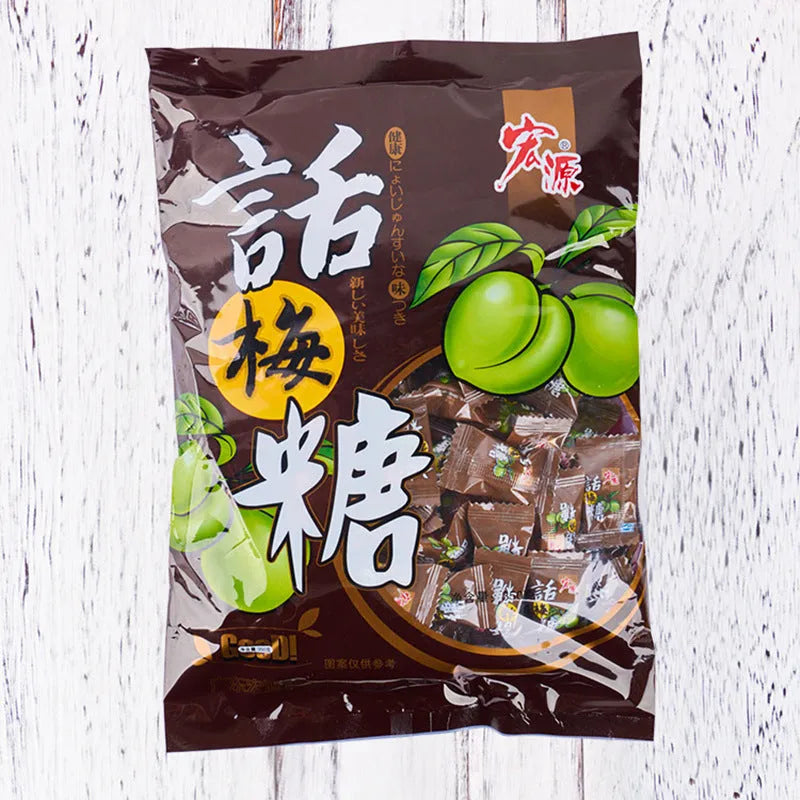 Three bags of hard candy: guava flavour (350g), plum sugar (350g), and tangerine peel (355g).