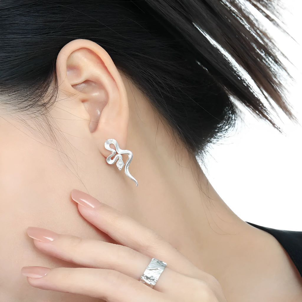 Snake-shaped textured S925 sterling silver stud earrings with inlaid zircon, 18K gold colour finish