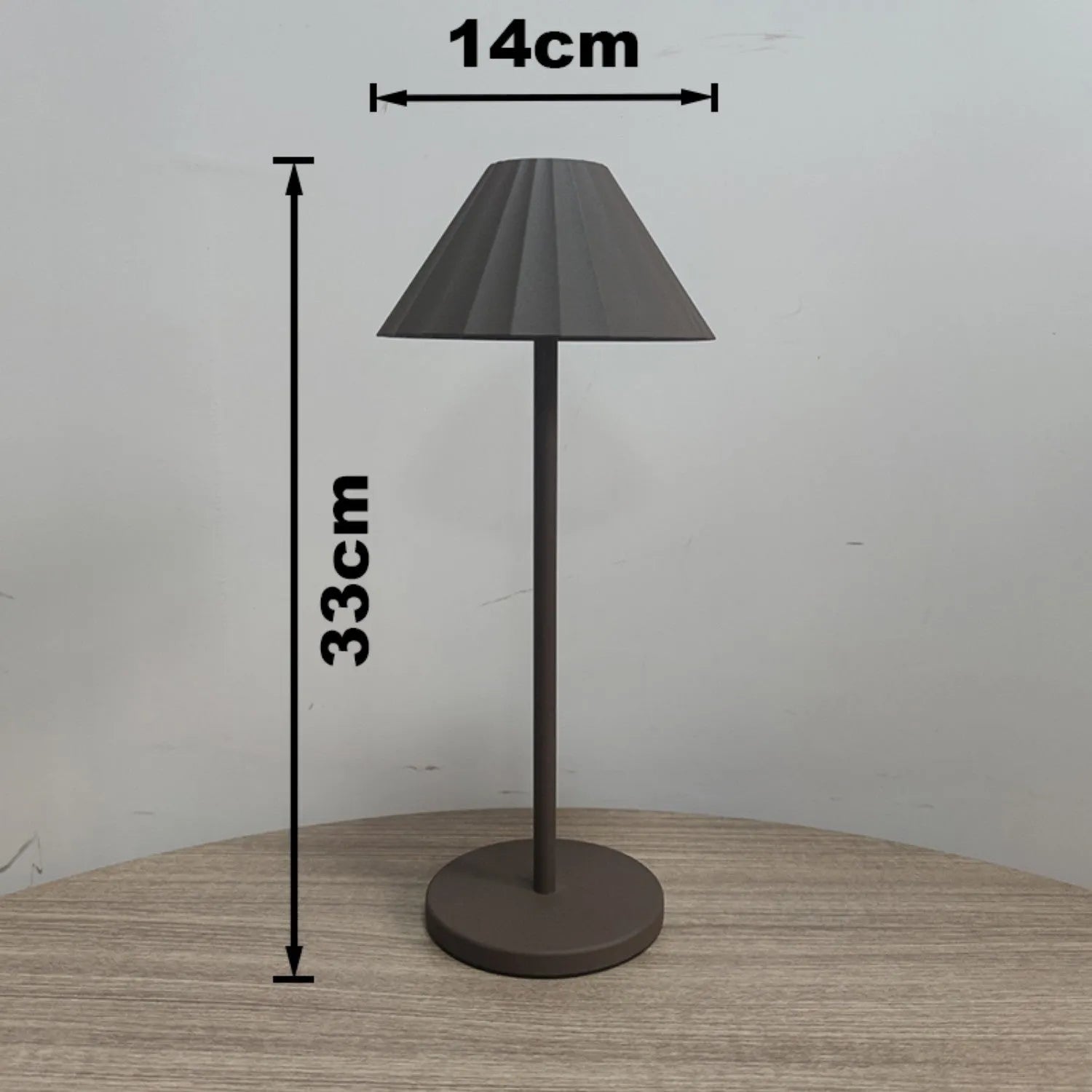 Black alloy desk lamp with touch dimming control and USB-C charging port on base.