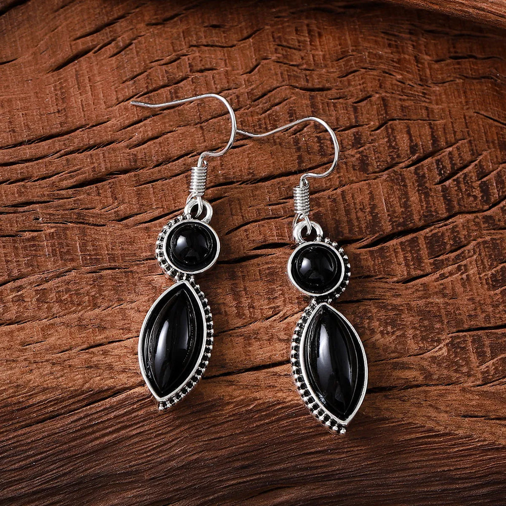 Vintage geometric pendant earrings with black and purple electroplated finish on zinc alloy.