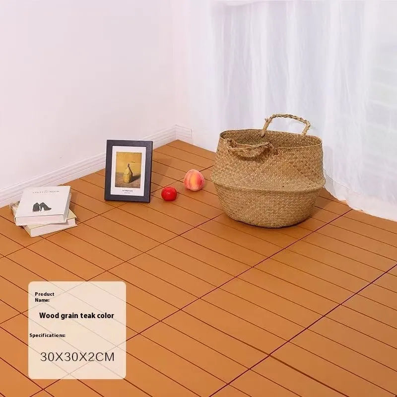 Wood grain plastic floor tiles in brown, grey and orange colours showing non-slip texture