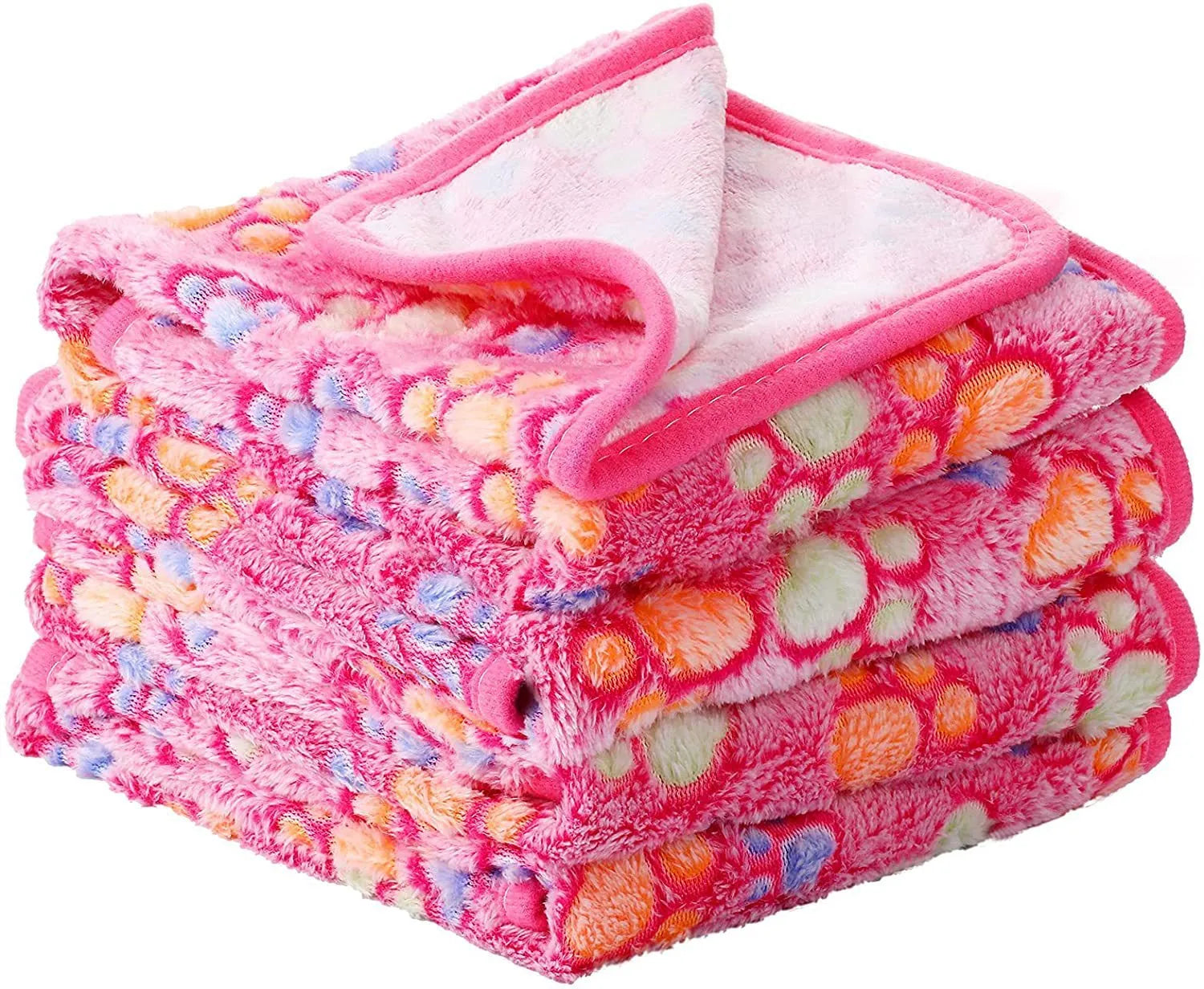Soft coral fleece dog blanket with a paw print design, shown in a beige colour.