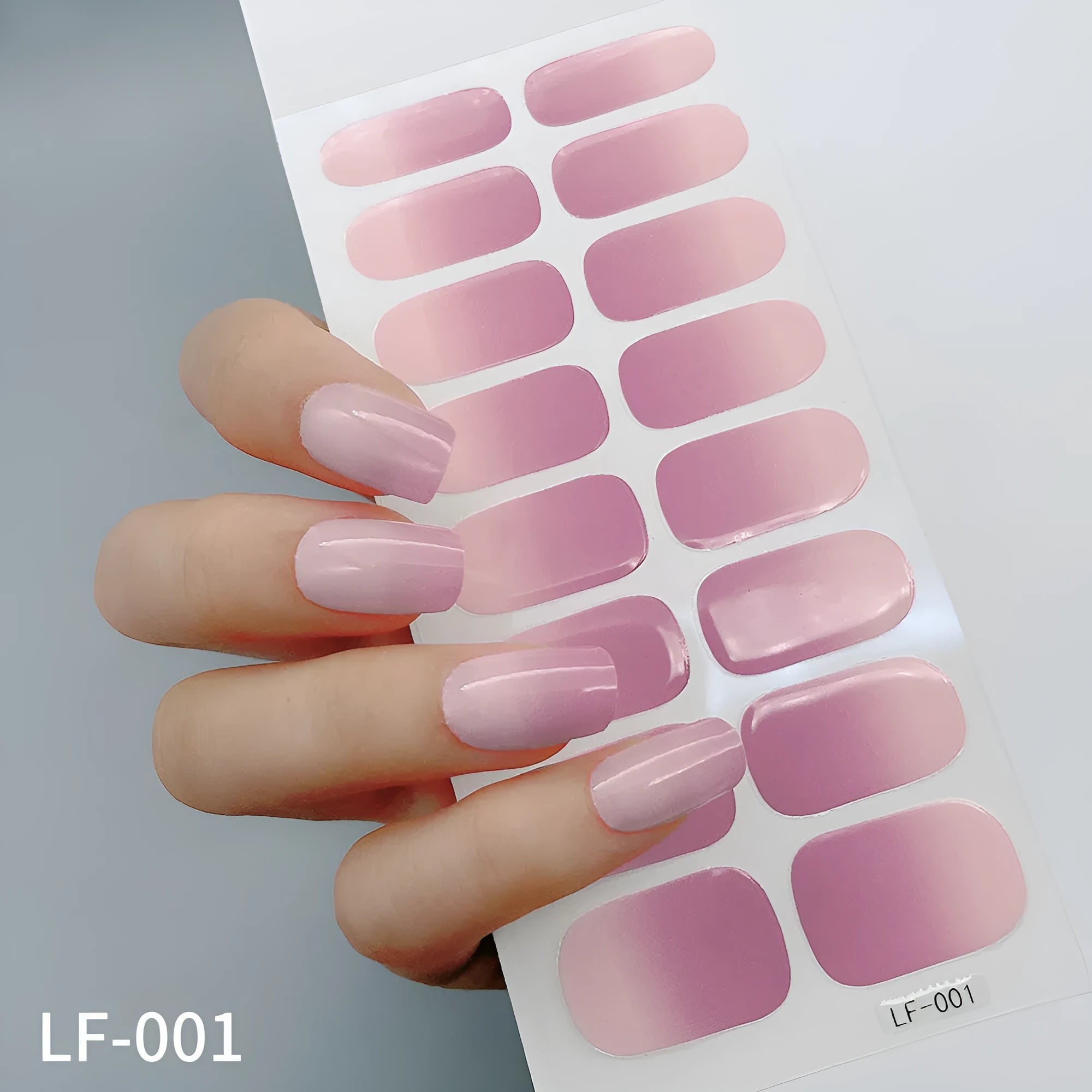 Full nail art sticker sheet showing 16 different solid colour designs including European simple nails and floral patterns