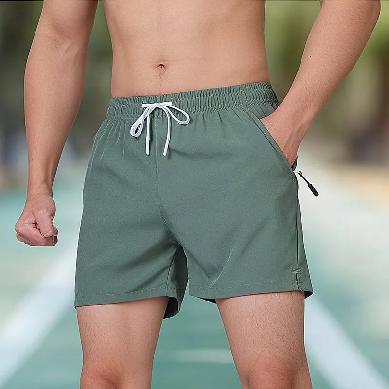 Men's black high-waisted fitness training shorts with drawstring waist closure
