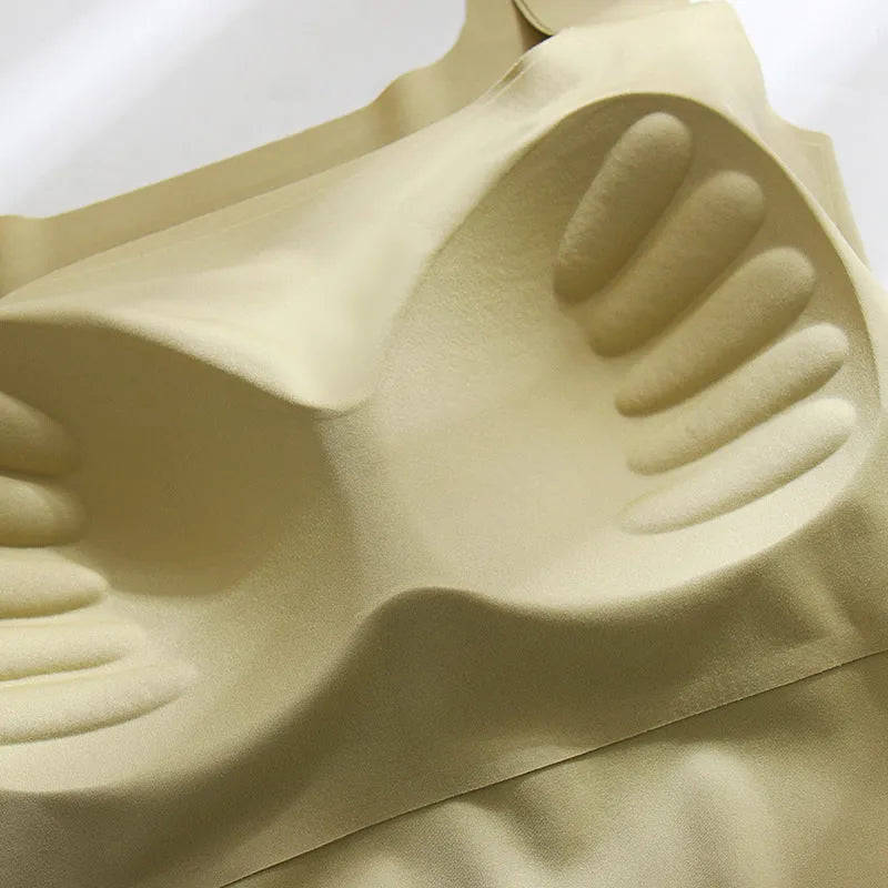 Women's white seamless sling vest with built-in fixation cup and chest pad, shown from the back.